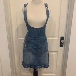 NWOT. Distressed denim skirtall.